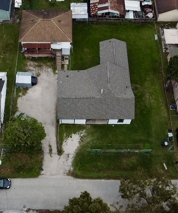 6929 San Angelo Street Houston, TX 77020 - Photo 3 of 24 an aerial view of a house with a yard