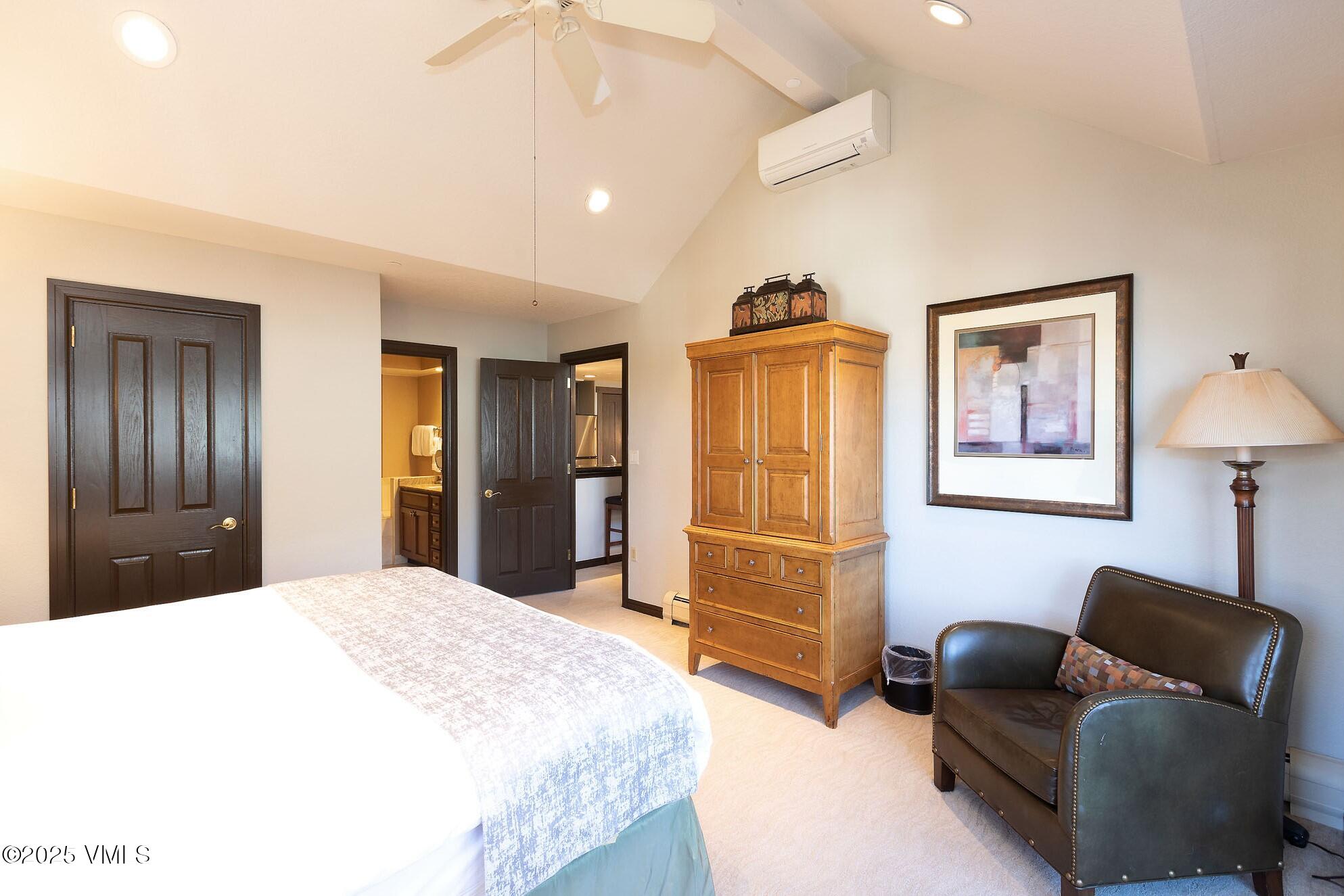 210 Offerson Road, Unit R203 WEEK 14 Beaver Creek, CO 81620 - Photo 13 of 31 a bedroom with a bed and couch