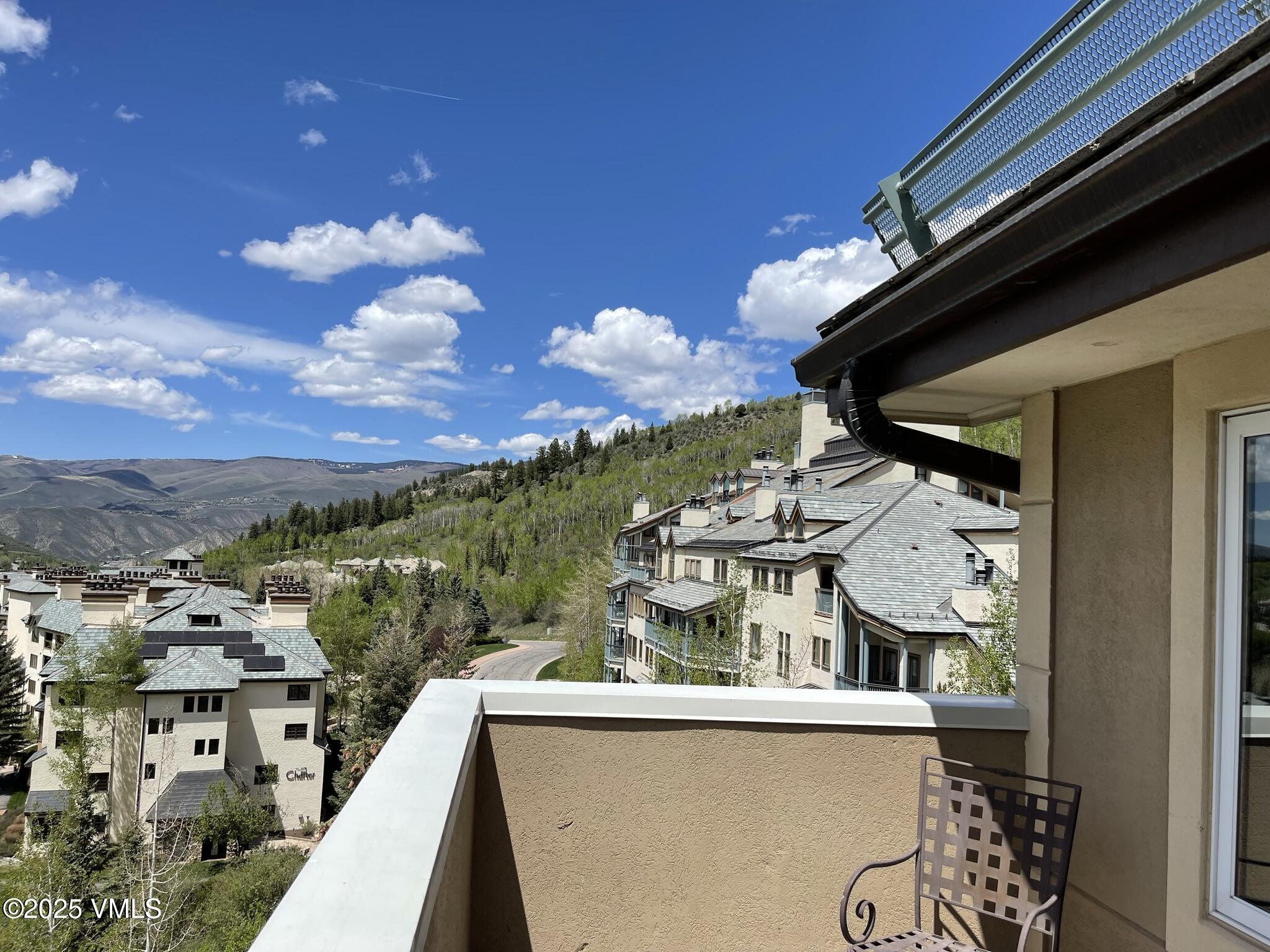 210 Offerson Road, Unit R203 WEEK 14 Beaver Creek, CO 81620 - Photo 5 of 31 a view of a balcony with furniture and a potted plant