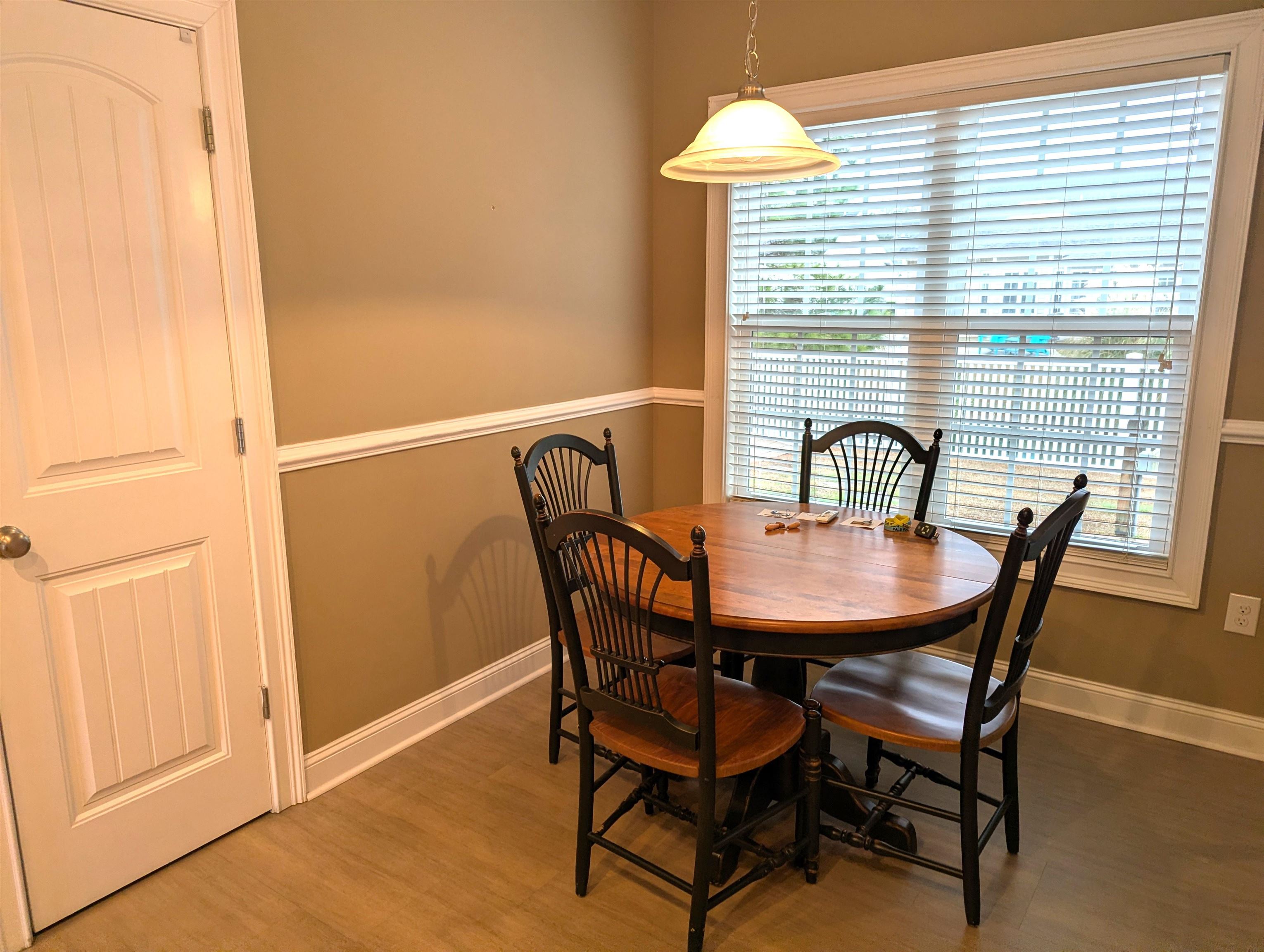 1100 Eureka Trail Longs, SC 29568 - Photo 13 of 40 Dining room with wood finished floors and baseboards