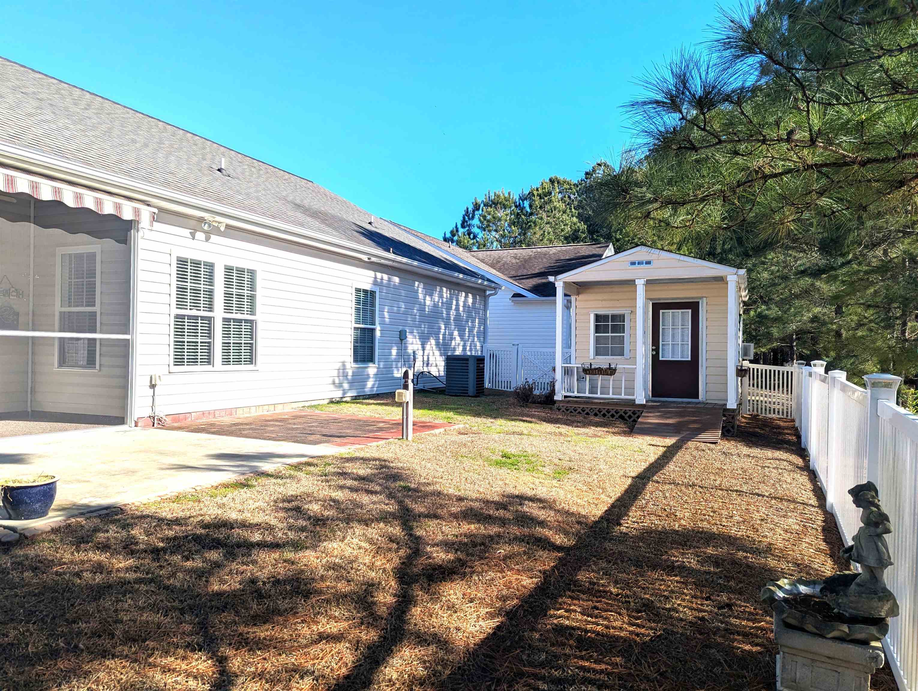 1100 Eureka Trail Longs, SC 29568 - Photo 28 of 40 Rear view of property with a wooden deck, a yard, and a shingled roof