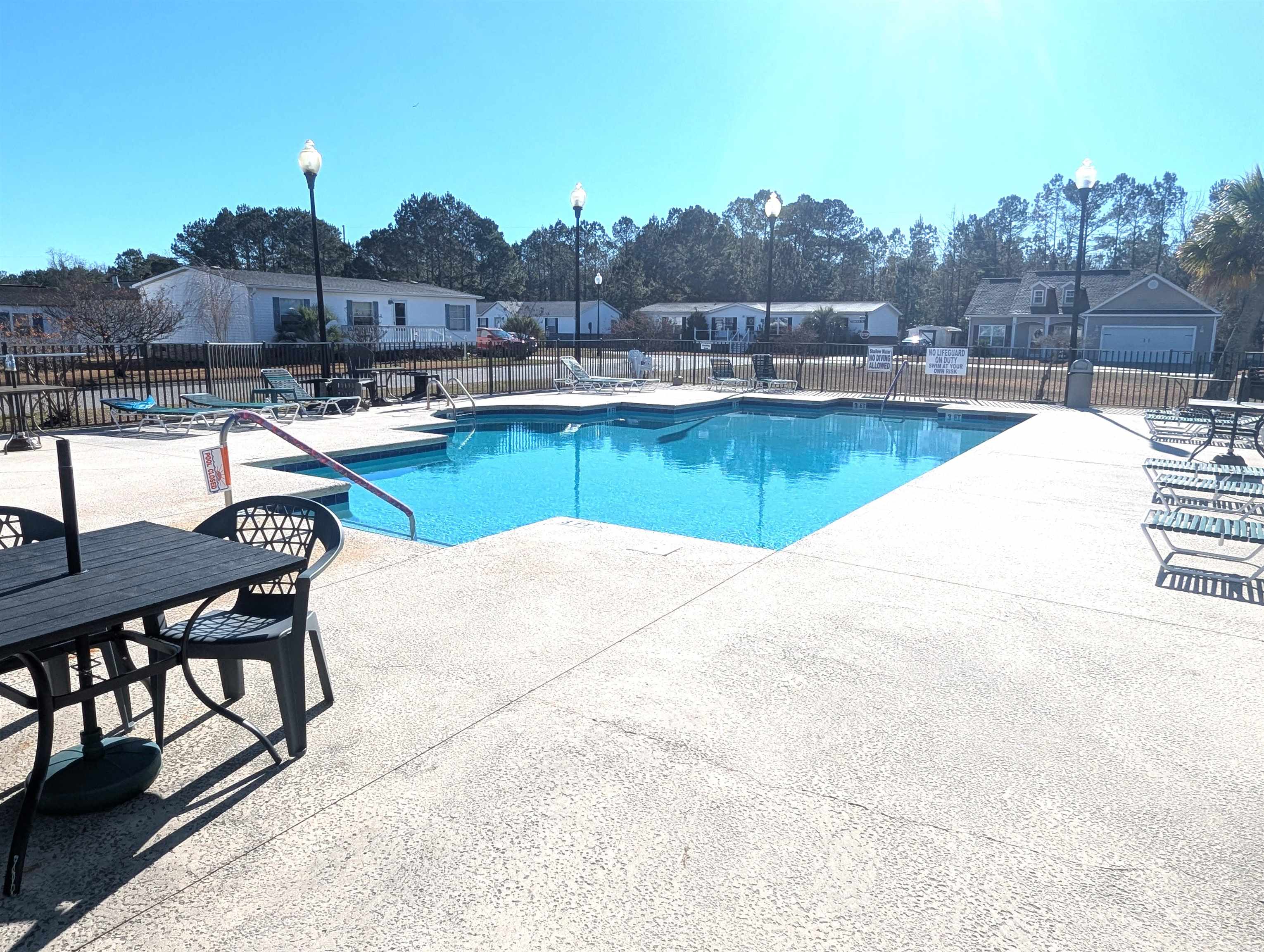 1100 Eureka Trail Longs, SC 29568 - Photo 39 of 40 Community pool featuring a patio and a residential view