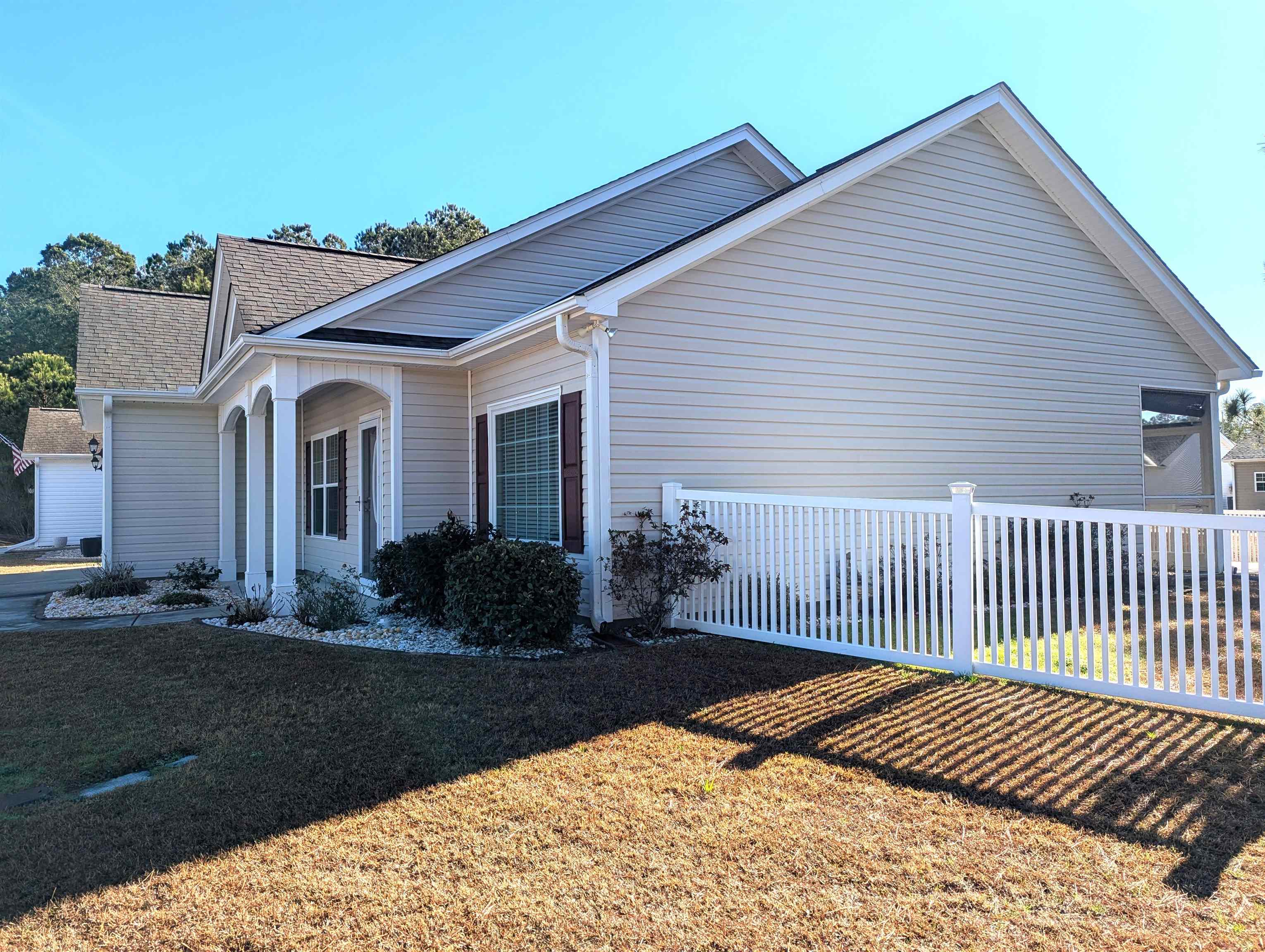 1100 Eureka Trail Longs, SC 29568 - Photo 4 of 40 View of property exterior featuring roof with shingles