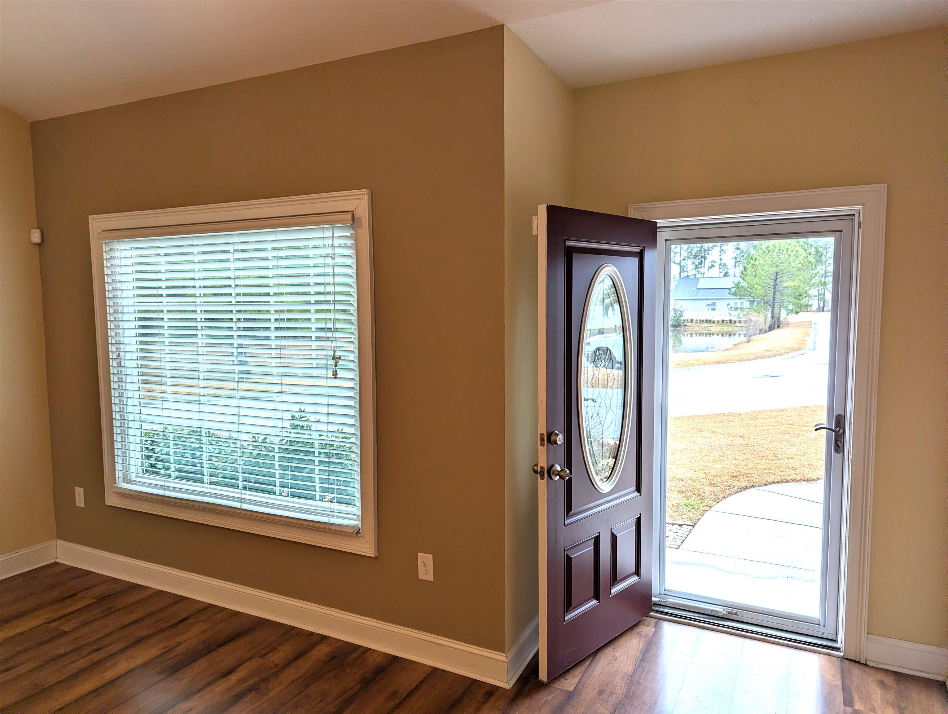 1100 Eureka Trail Longs, SC 29568 - Photo 5 of 40 Foyer with plenty of natural light and dark wood-style flooring