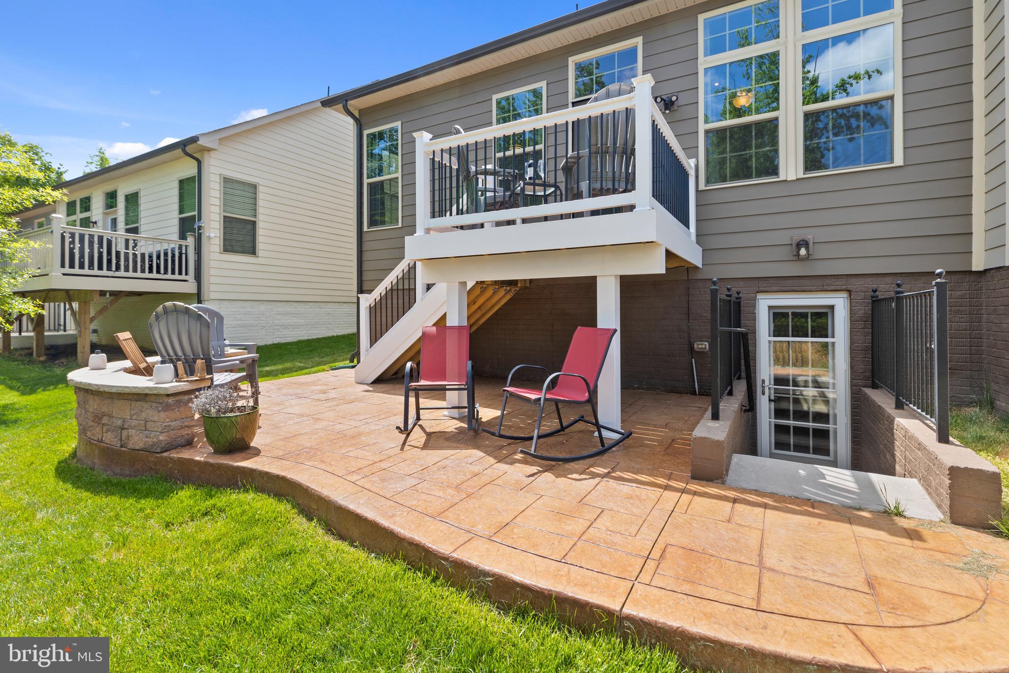 18221 Red Mulberry Road Dumfries, VA 22026 - Photo 50 of 72 Custom Stamped patio! Rear basement entrance!