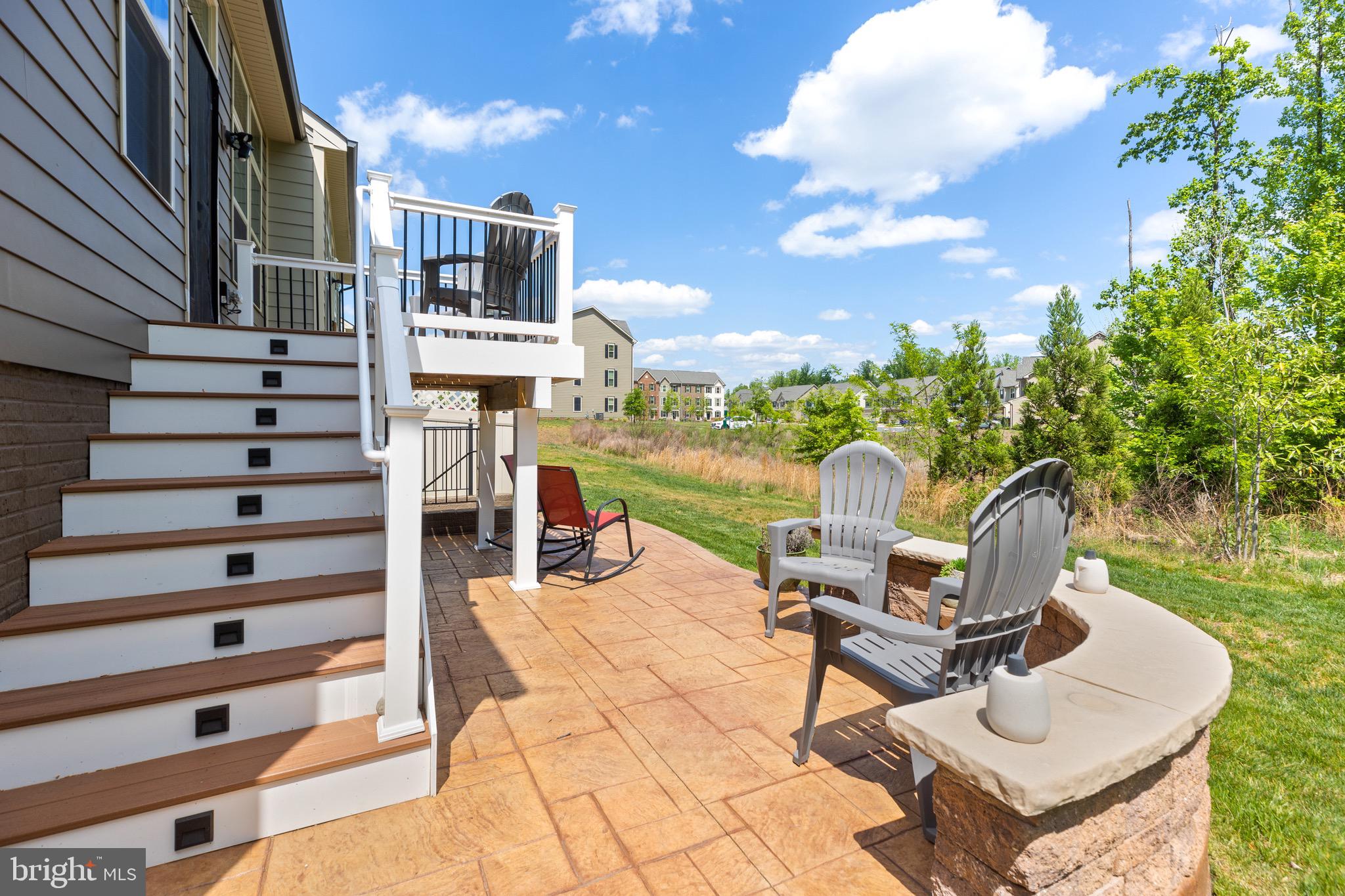 18221 Red Mulberry Road Dumfries, VA 22026 - Photo 52 of 72 Custom Stamped patio and retaining wall