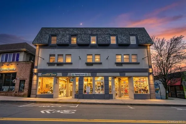 a view of a building on the street