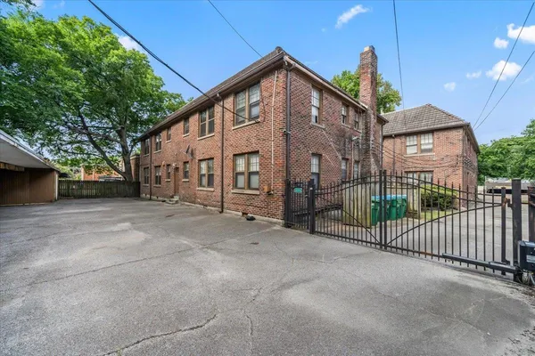 a view of a house with a street