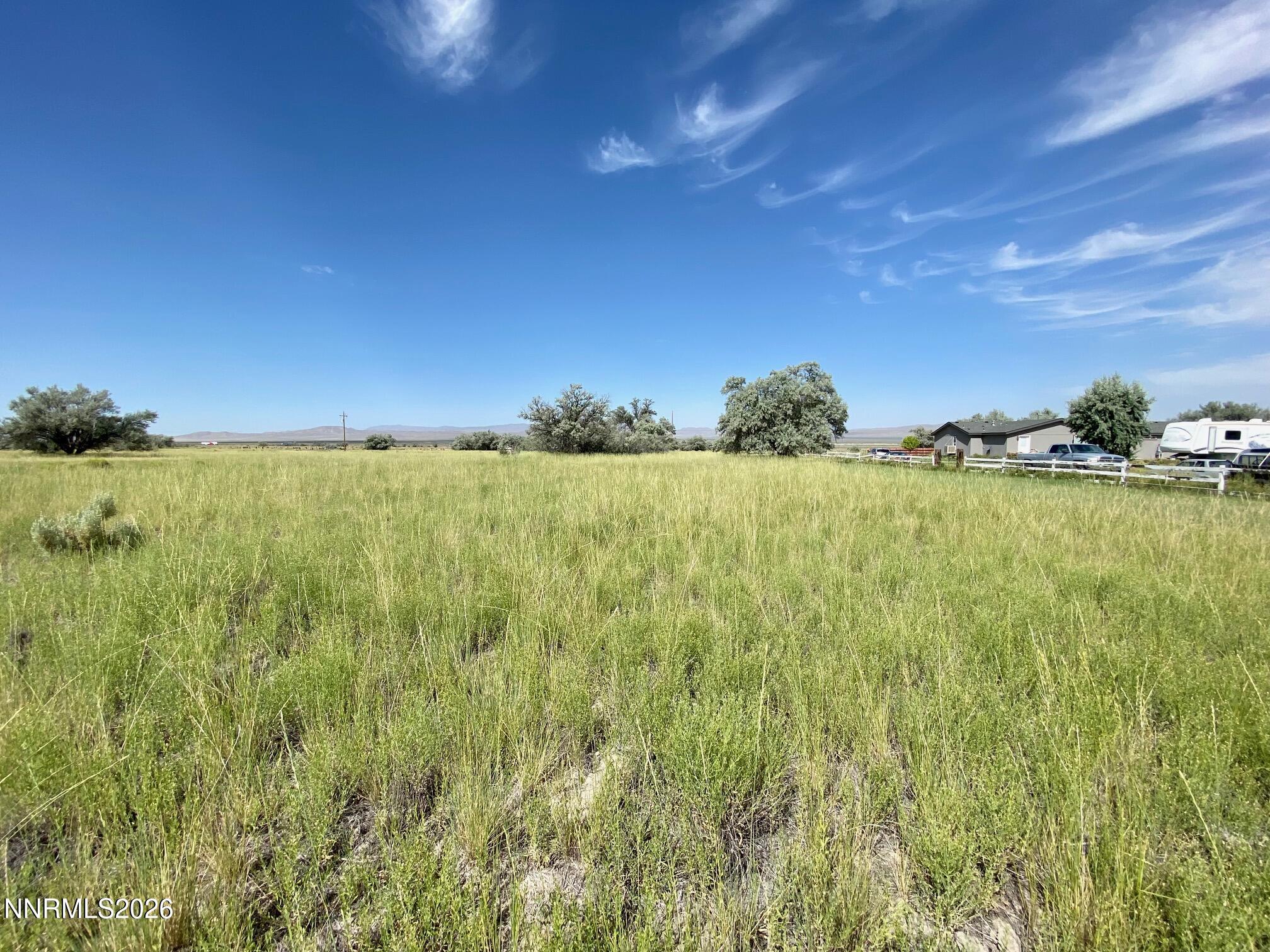22150 Chimney Creek Road Lovelock, NV 89419 - Photo 8 of 11 a view of a big yard with large trees