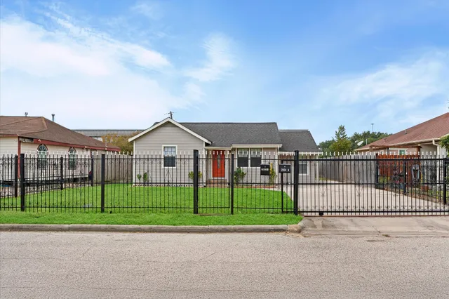 a view of a small white house