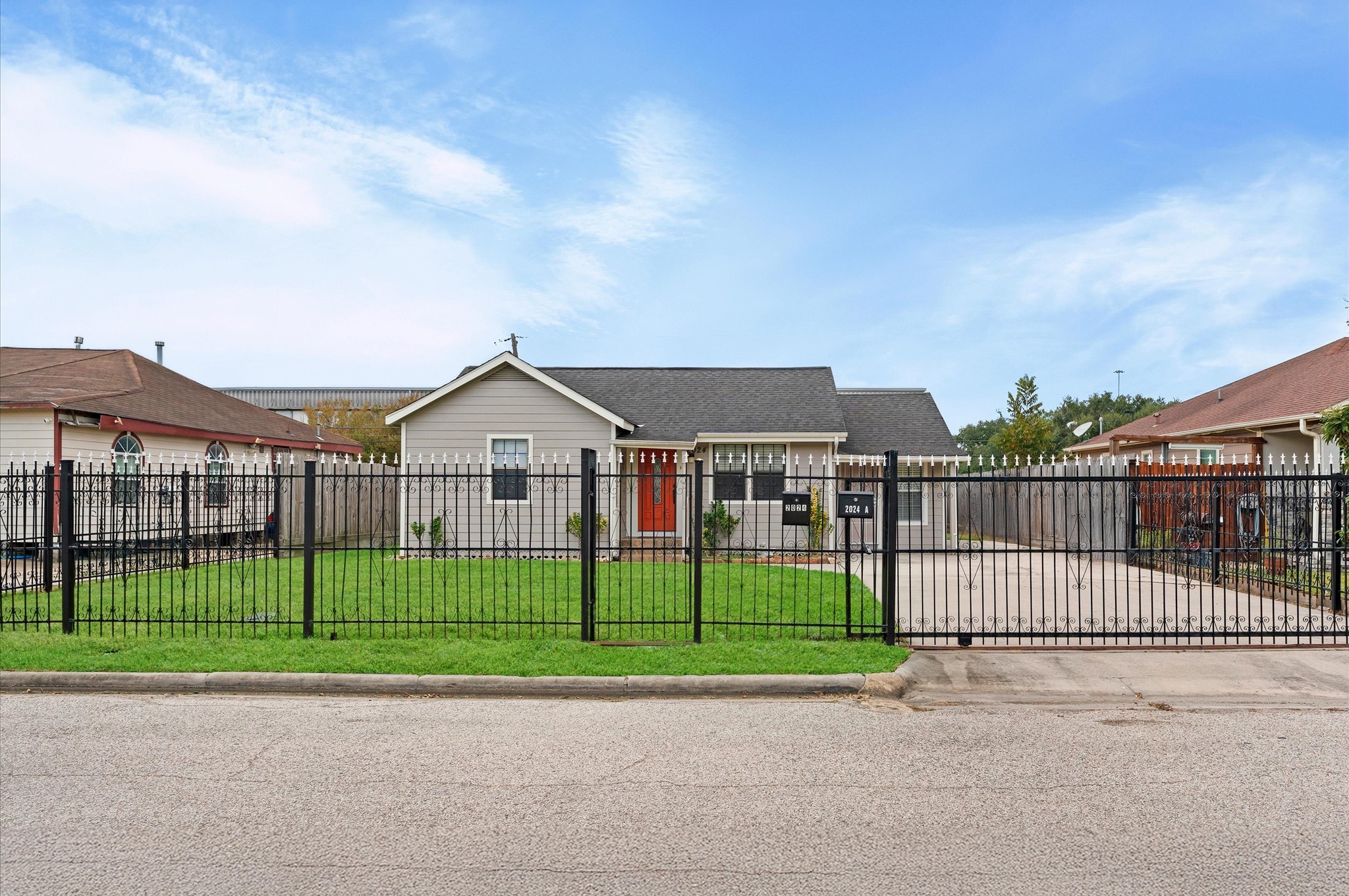 2024 Jean Street Houston, TX 77204 - Photo 7 of 23 a view of a small white house