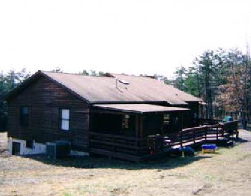 3675 Flatwoods Road Elliston, VA 24087 - Photo 1 of 2 a front view of a house with a yard