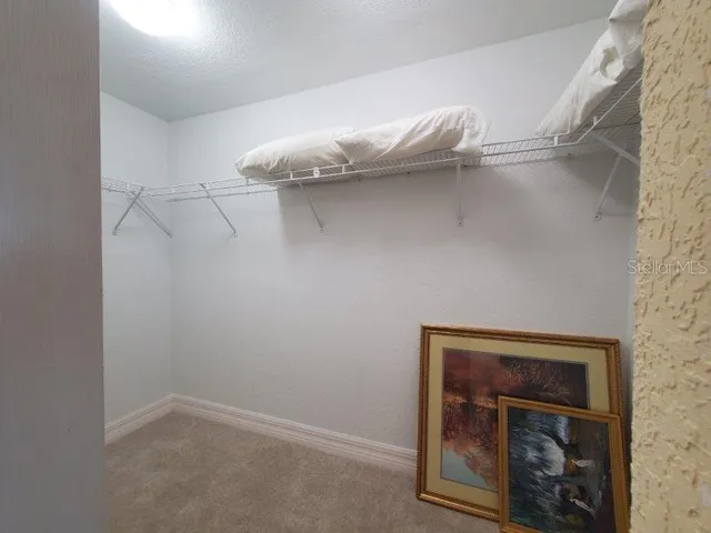 a view of a room with rack on the wall