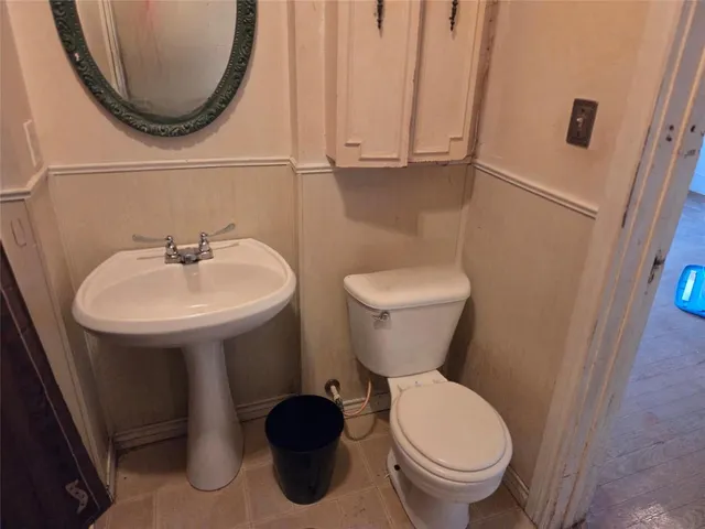 a house with trees in the background