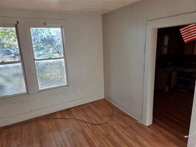 a view of an empty room and window