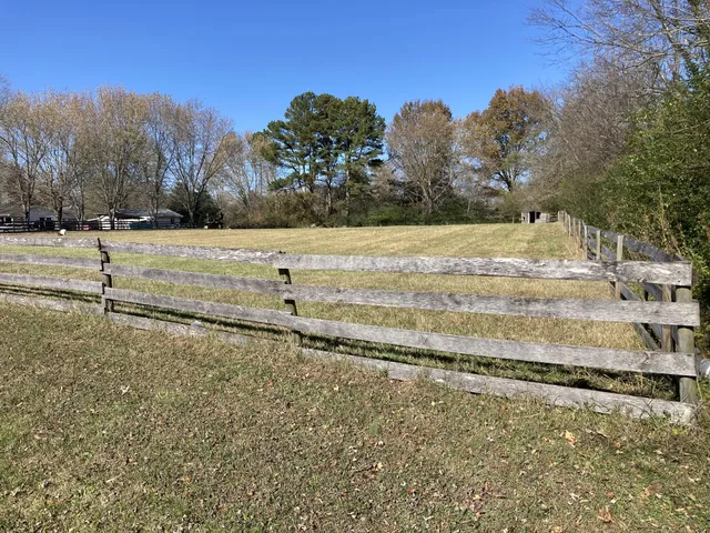 a view of a yard with an ocean view