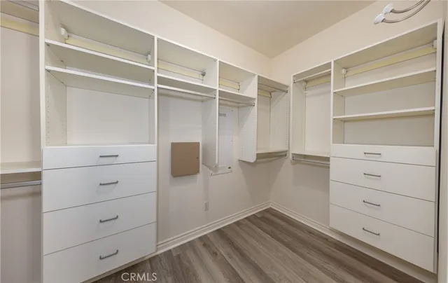 a view of an empty walk in closet