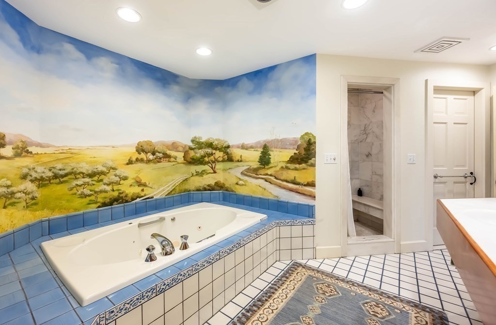 9 A Bancroft Road Andover, MA 01810 - Photo 24 of 37 a bathroom with a tub and a sink