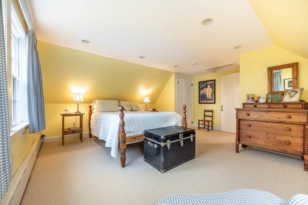 9 A Bancroft Road Andover, MA 01810 - Photo 29 of 37 a bed room with a bed and furniture