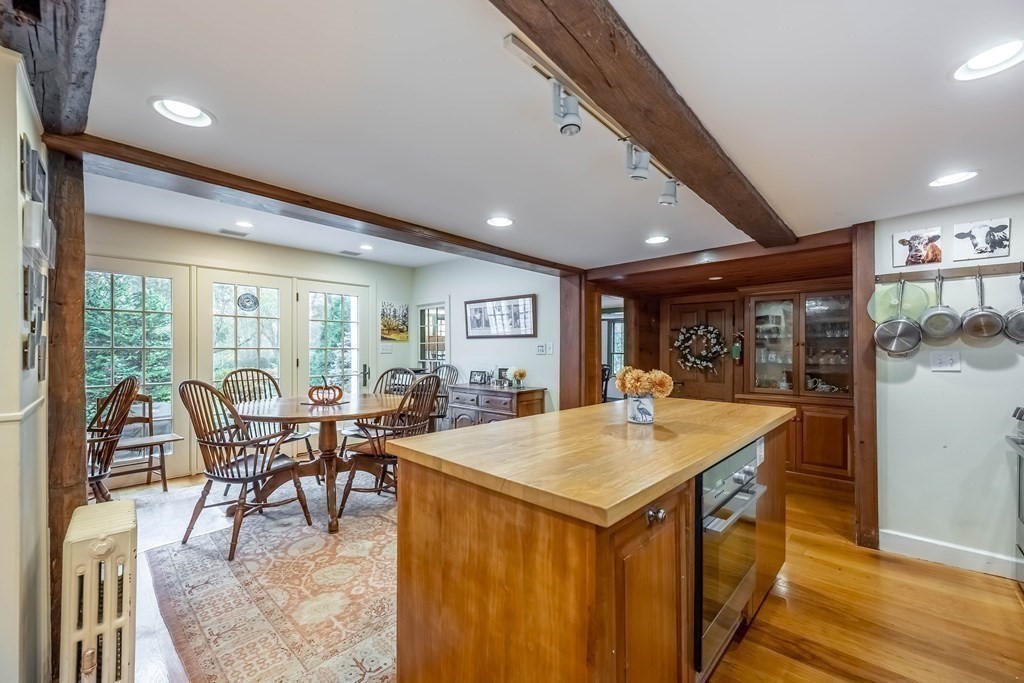 9 A Bancroft Road Andover, MA 01810 - Photo 5 of 37 a view of a dining room with furniture window and outside view