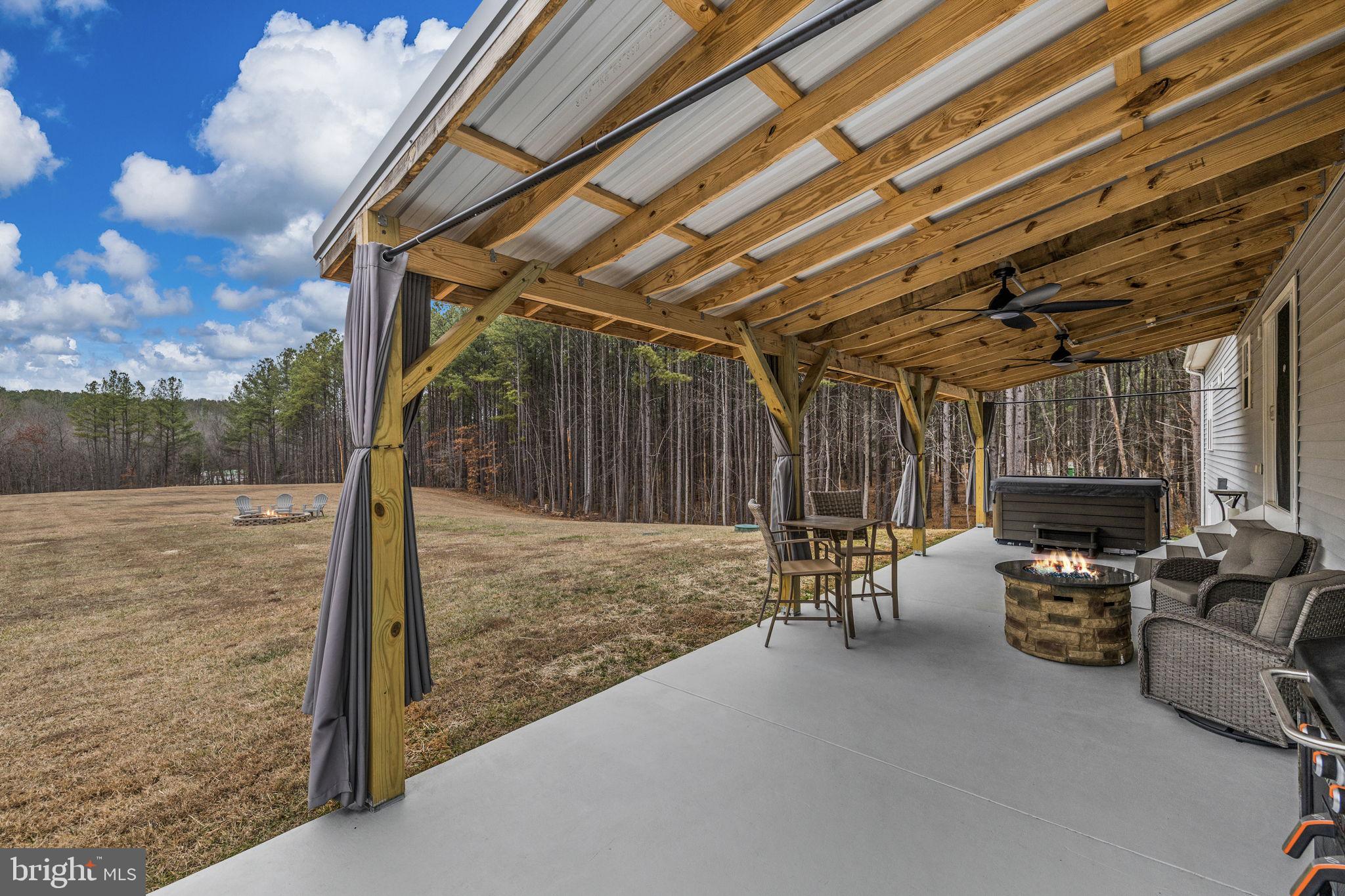 11026 Tower Road Unionville, VA 22567 - Photo 31 of 53 Rear Covered Porch with Hot Tub