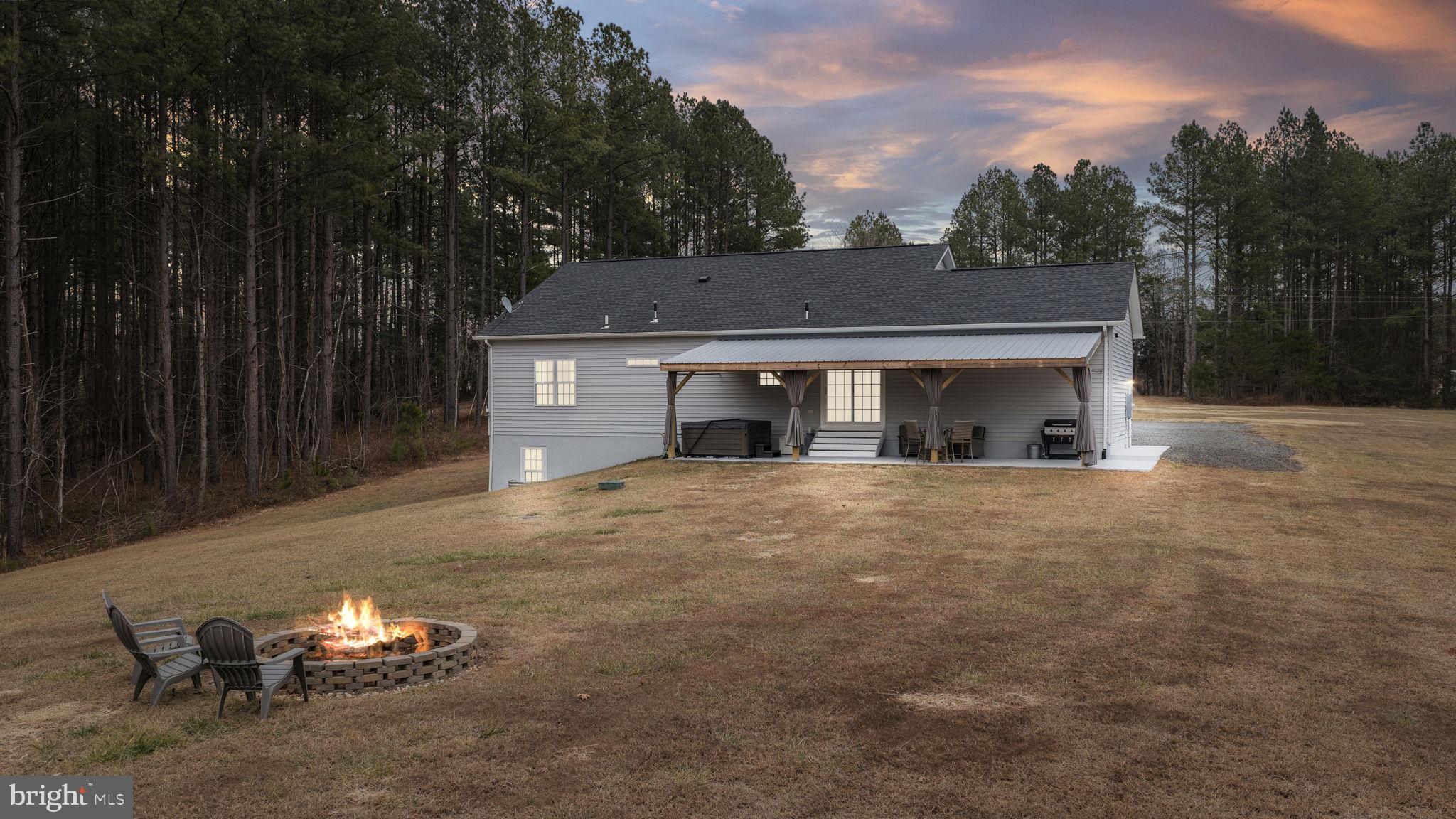 11026 Tower Road Unionville, VA 22567 - Photo 37 of 53 Firepit in large back yard