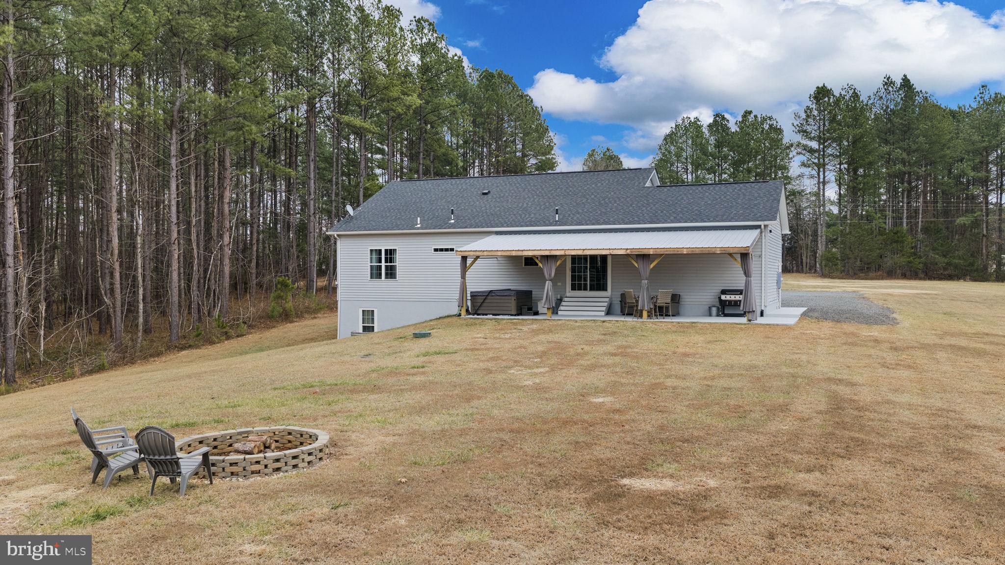 11026 Tower Road Unionville, VA 22567 - Photo 39 of 53 Back Yard with fire pit