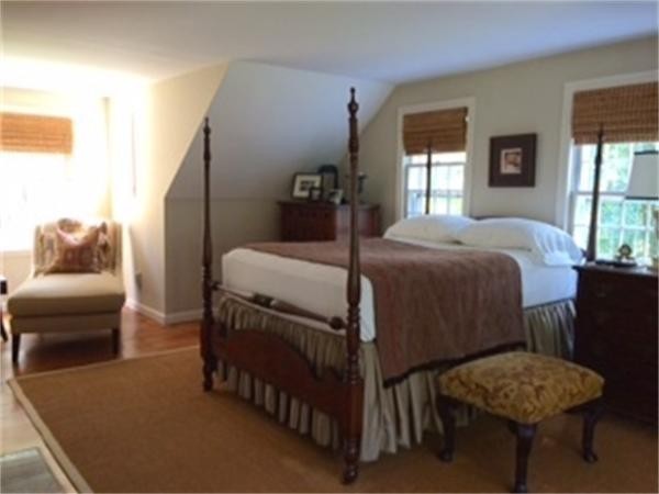 29 Harkness Road Pelham, MA 01002 - Photo 22 of 30 a bedroom with a bed and a couch