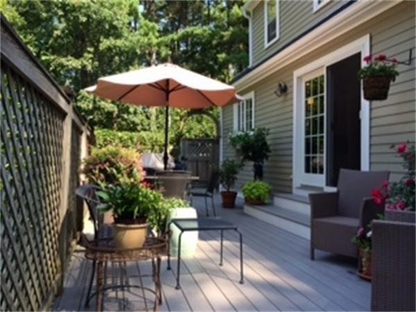 29 Harkness Road Pelham, MA 01002 - Photo 5 of 30 a view of a house with backyard sitting area and furniture