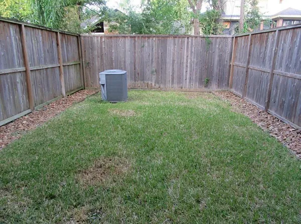 a backyard of a house with green space