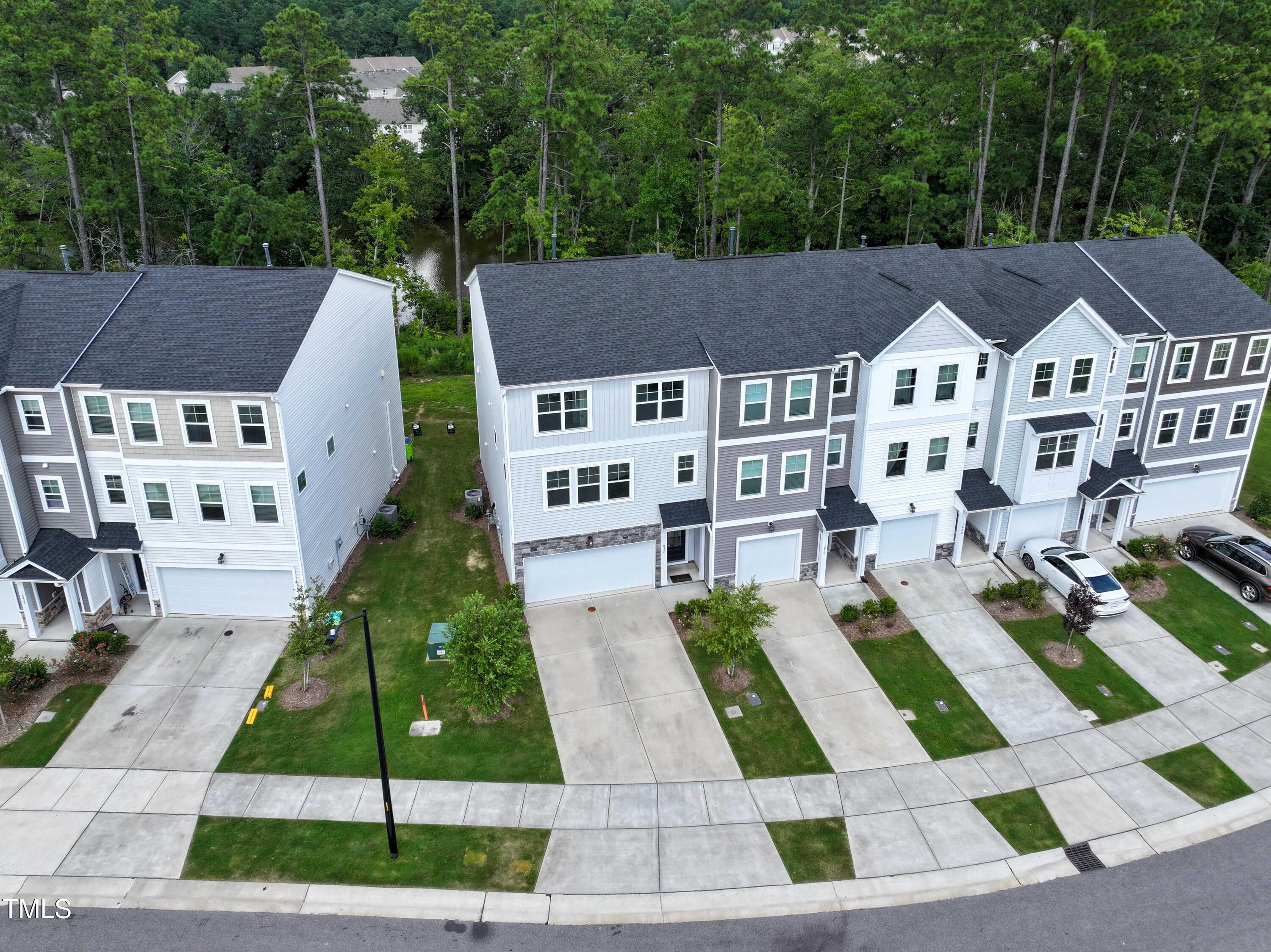 1032 Shoreside Drive Durham, NC 27713 - Photo 27 of 31 a aerial view of a house with a yard