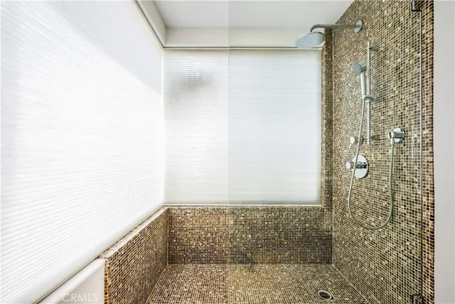 an aerial view of a residential apartment building with a yard