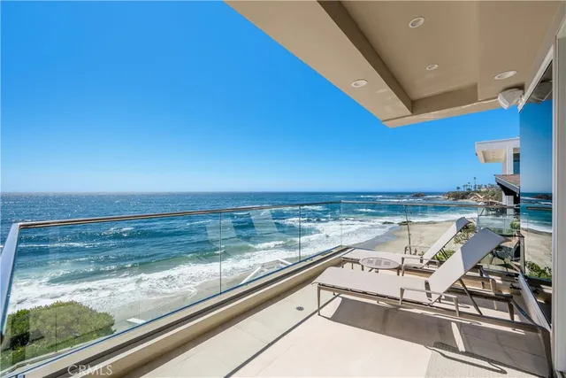 a living room with fireplace furniture and a dining table with wooden floor
