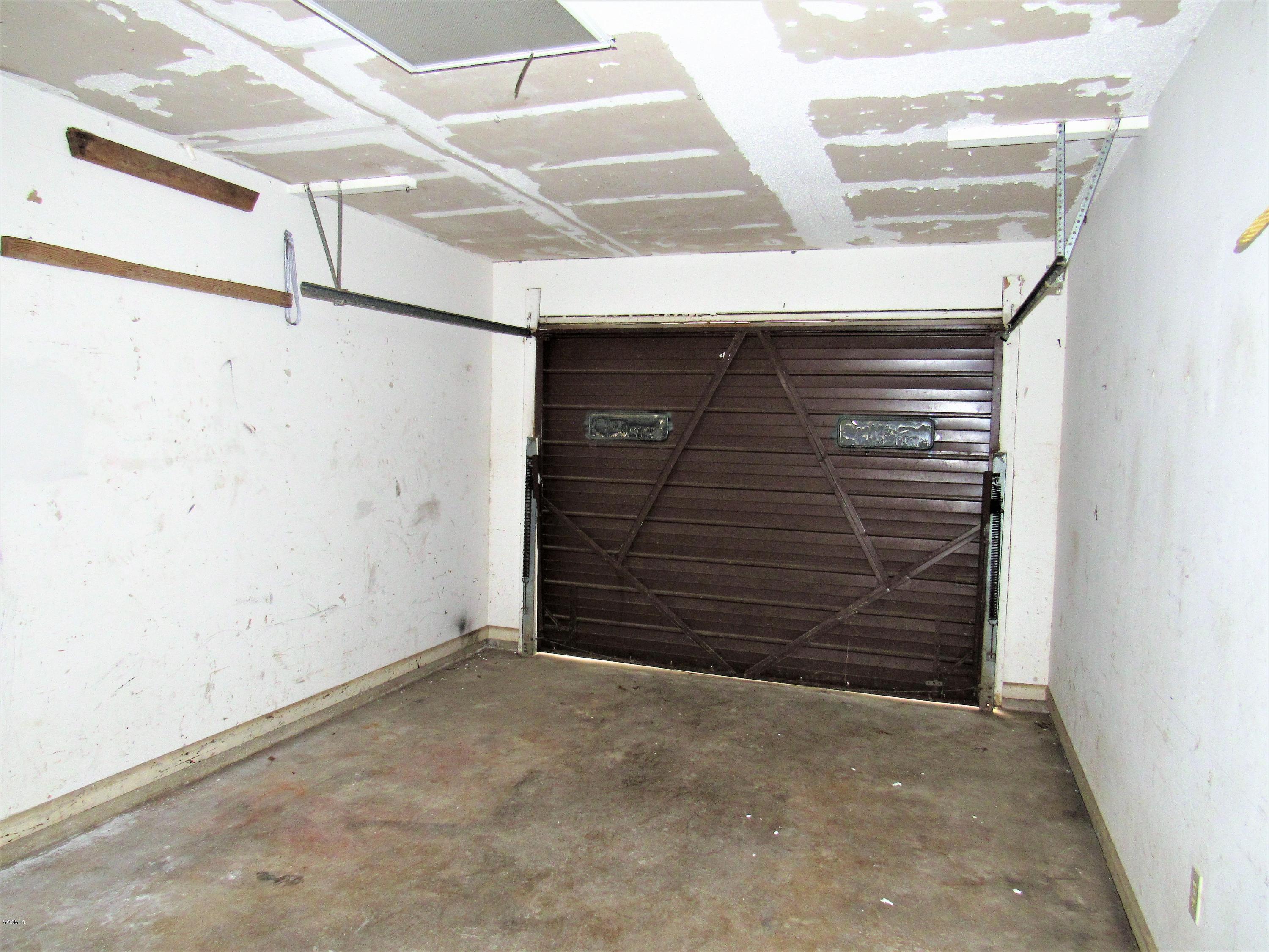 22716 Blackwell Farm Road Saucier, MS 39574 - Photo 16 of 21 GARAGE VIEW 1