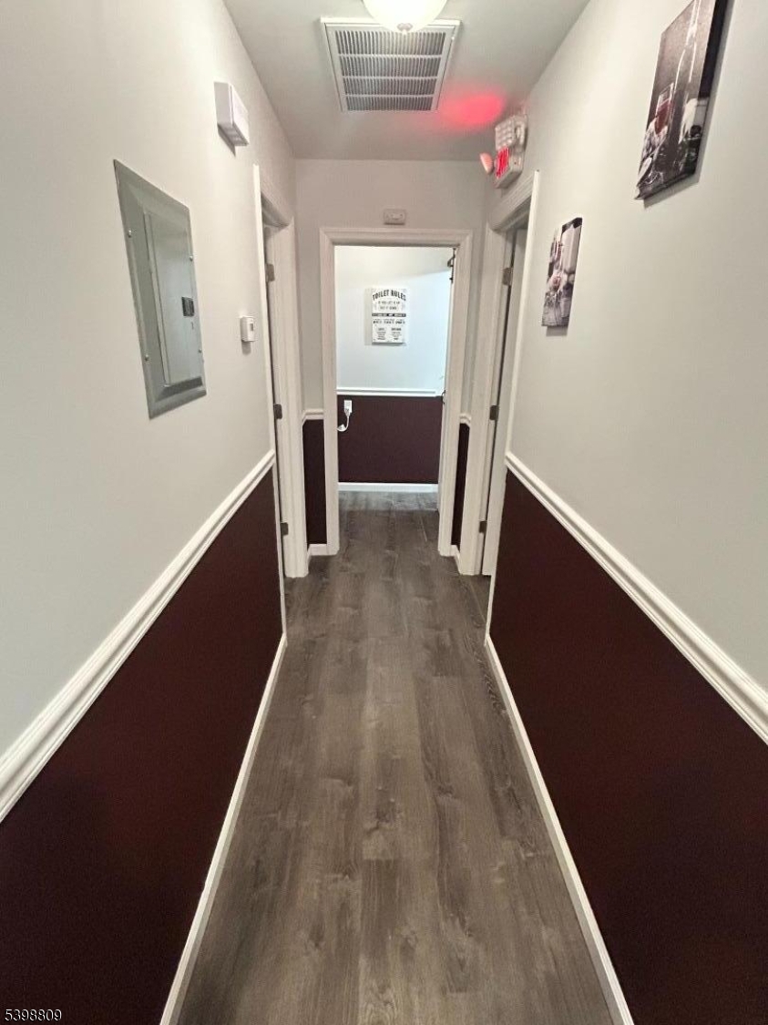 142 Mapes Avenue, Unit 3 Newark, NJ 07112 - Photo 3 of 8 a view of hallway with stairs