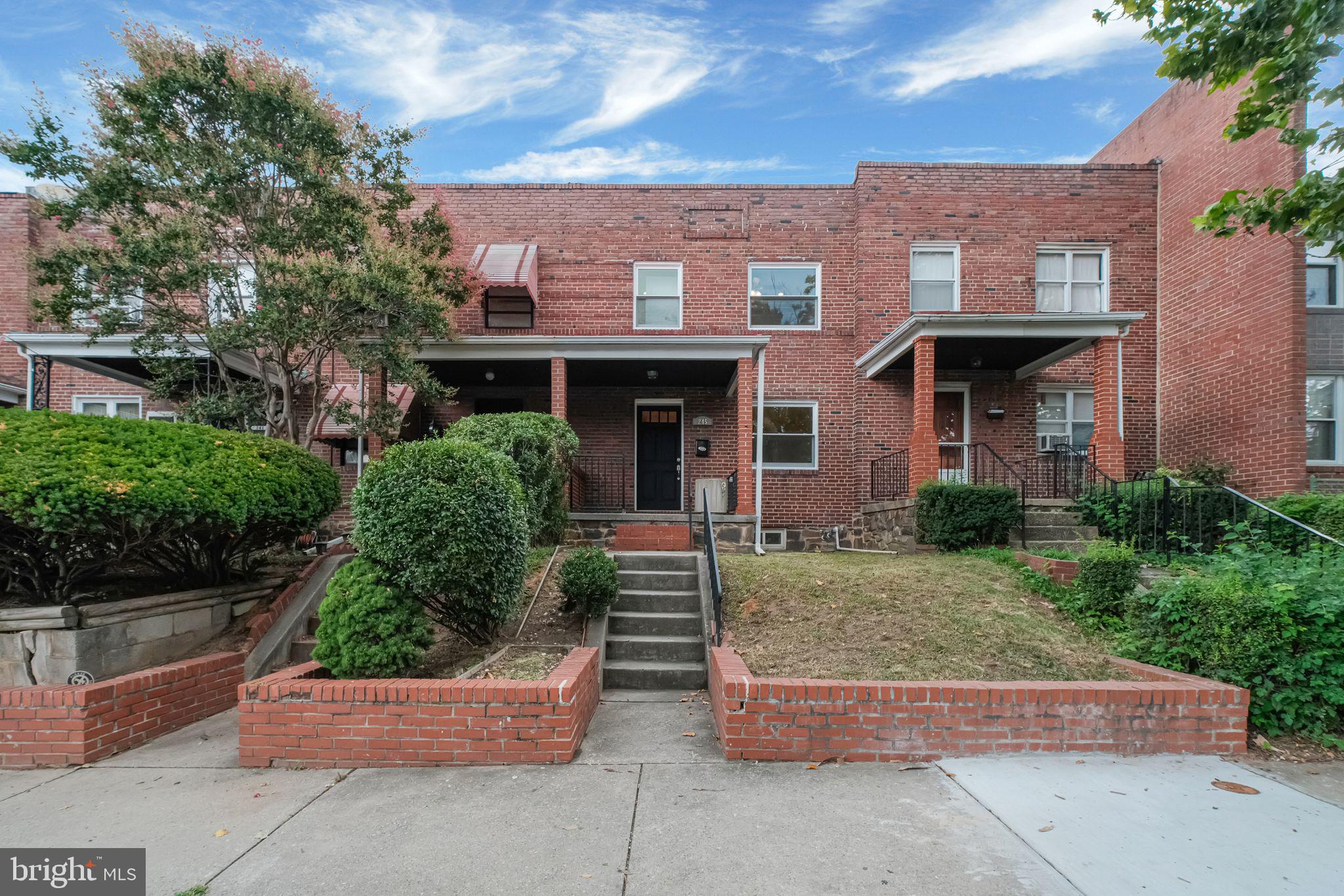 a view of a house with a garden