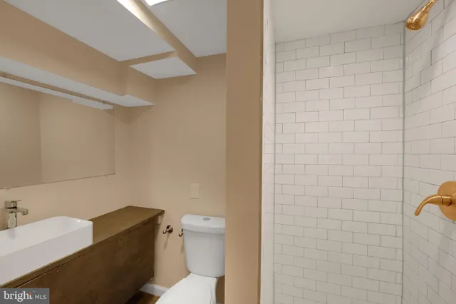 a front view of a building with sitting area