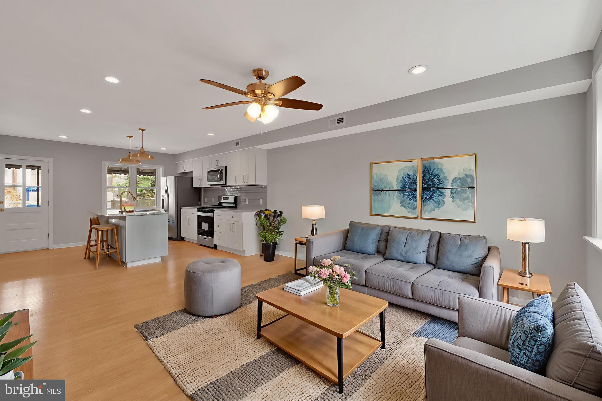245 South Clinton Street Baltimore, MD 21224 - Photo 5 of 39 a living room with furniture