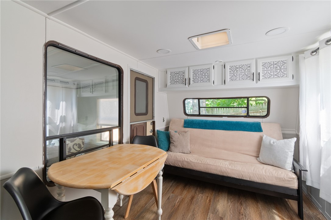 7945 Lake Road, Unit 129 Sodus, NY 14555 - Photo 15 of 22 The dining area - all new flooring!
