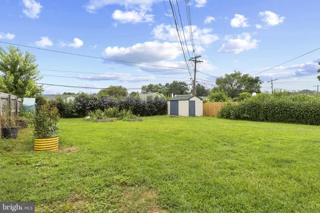 a view of a house with a big yard