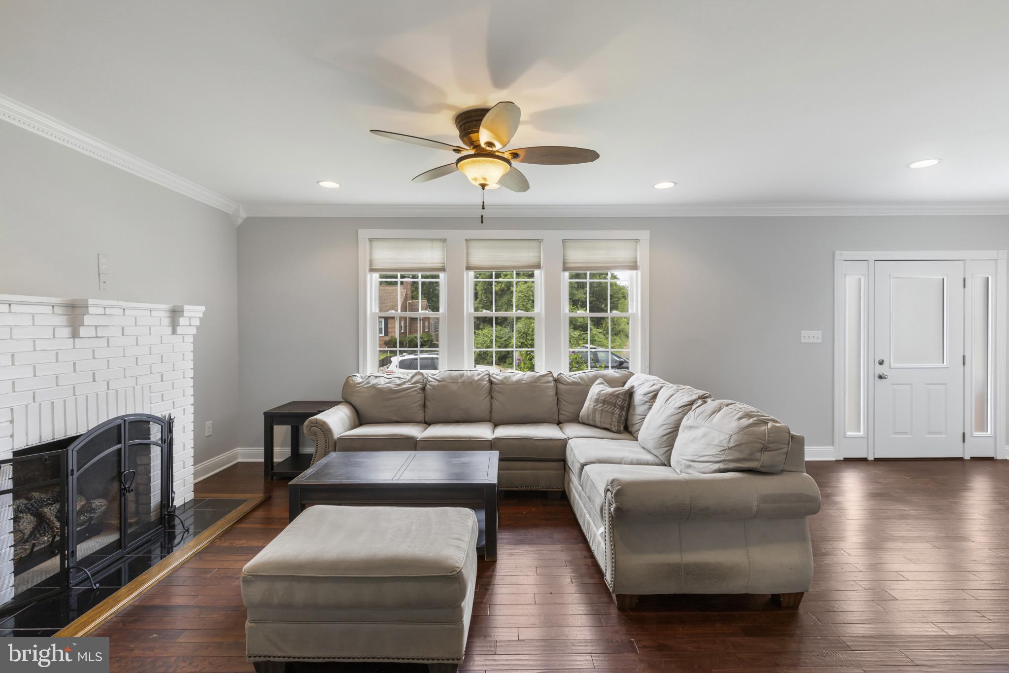 Sunny Living Room with Fireplace