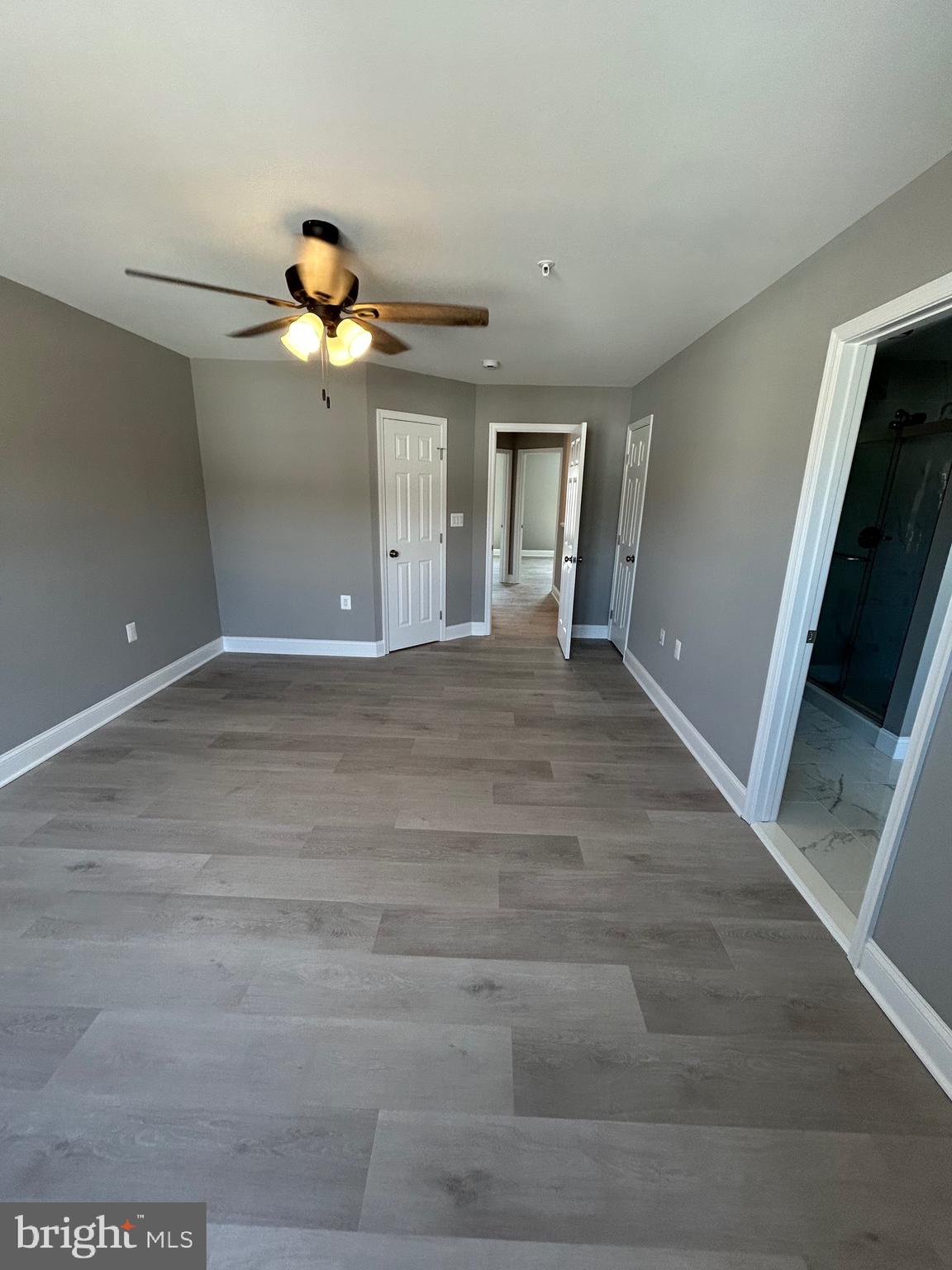 4739 Witchhazel Way Aberdeen, MD 21001 - Photo 12 of 32 a view of a livingroom with a ceiling fan and window