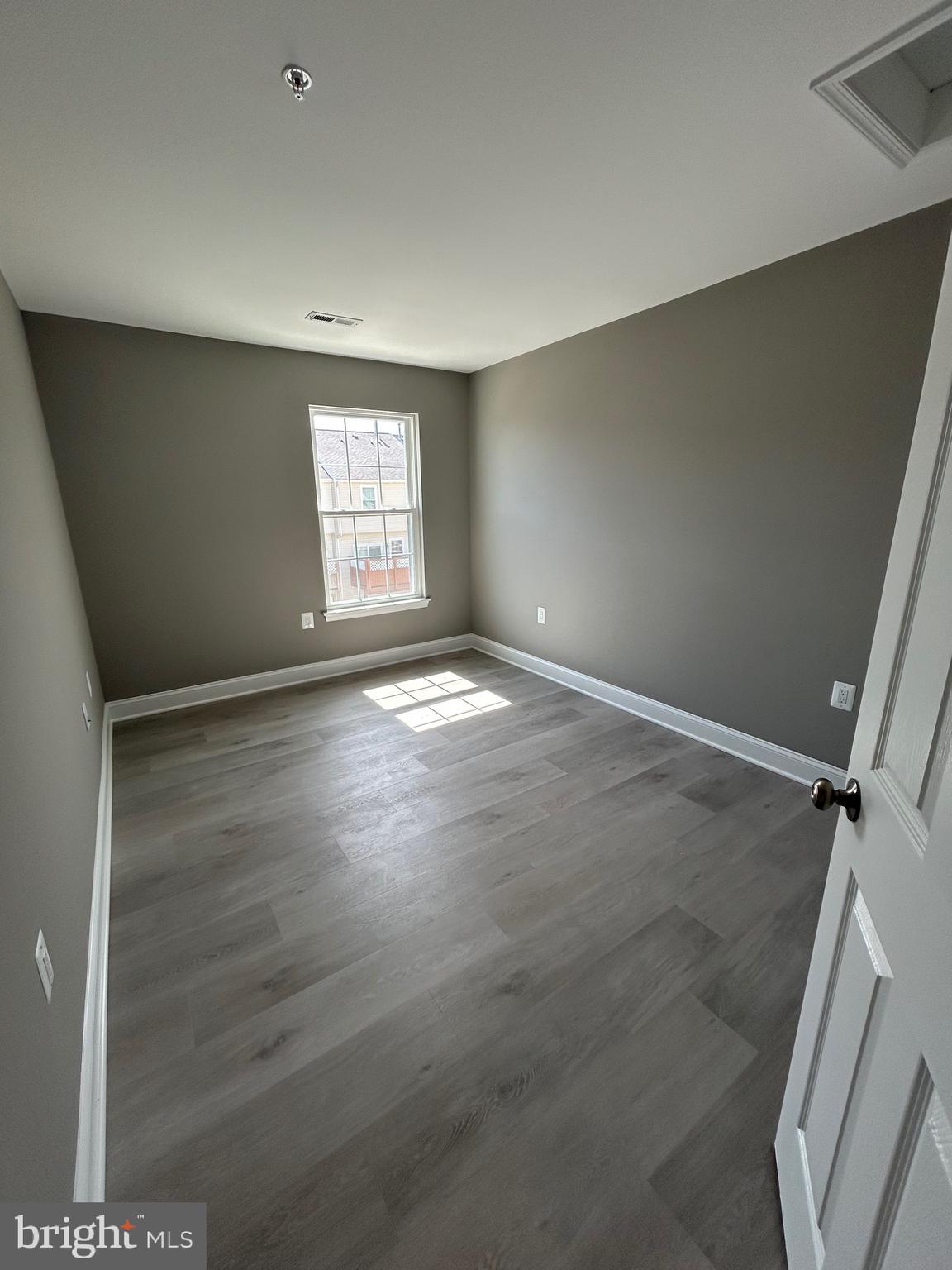 4739 Witchhazel Way Aberdeen, MD 21001 - Photo 17 of 32 an empty room with windows