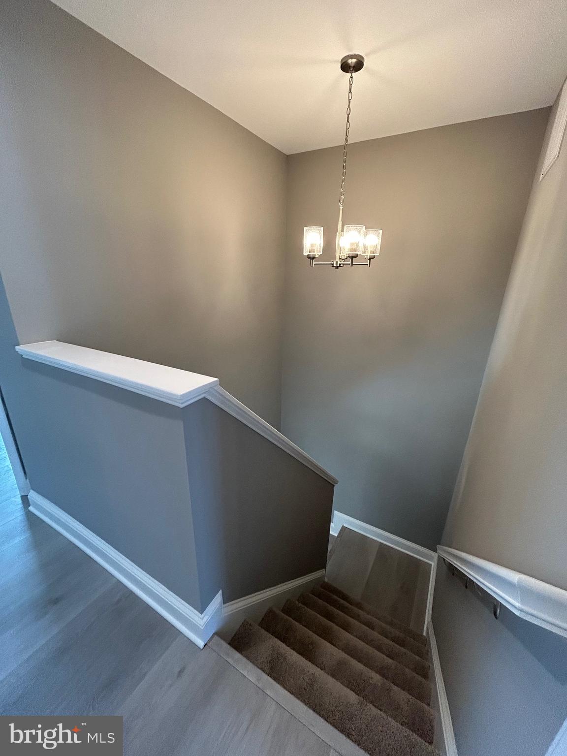 4739 Witchhazel Way Aberdeen, MD 21001 - Photo 22 of 32 a view of a room with wooden floor and windows