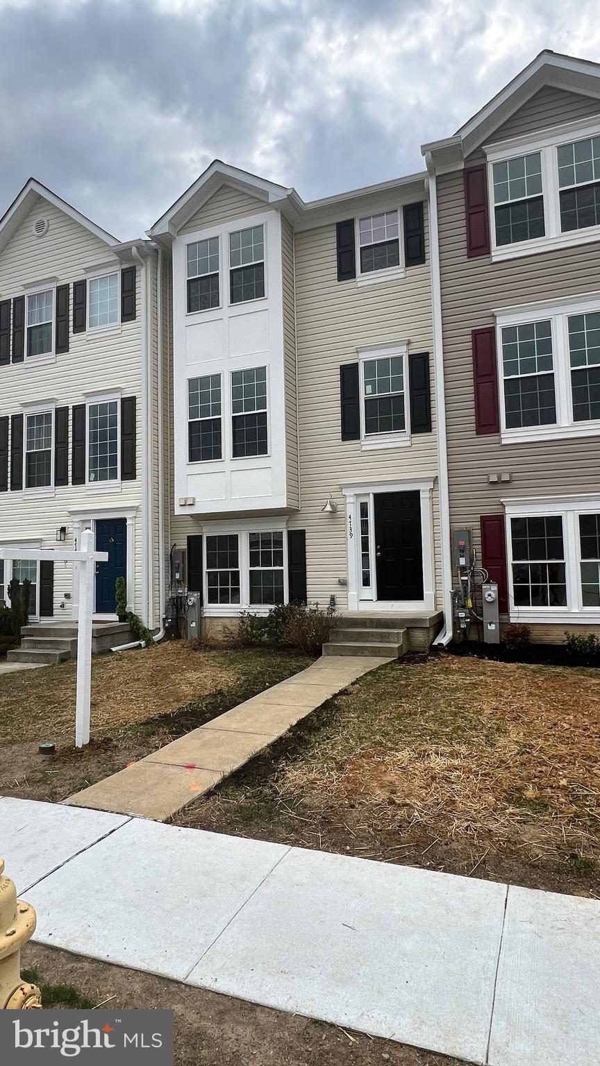 4739 Witchhazel Way Aberdeen, MD 21001 - Photo 3 of 32 a front view of residential houses with yard