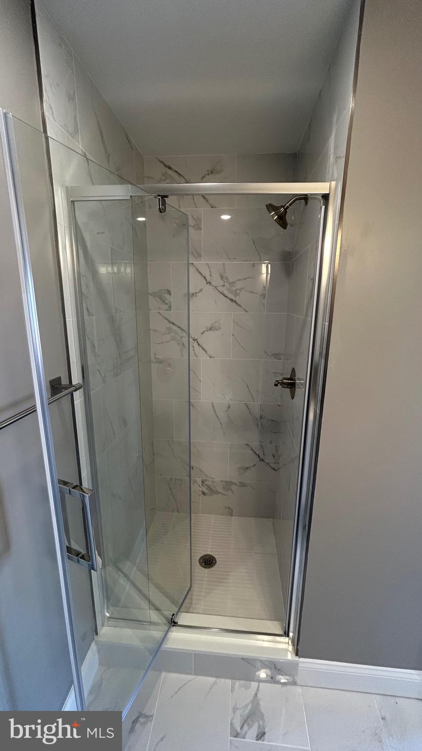 4739 Witchhazel Way Aberdeen, MD 21001 - Photo 31 of 32 a bathroom with a shower