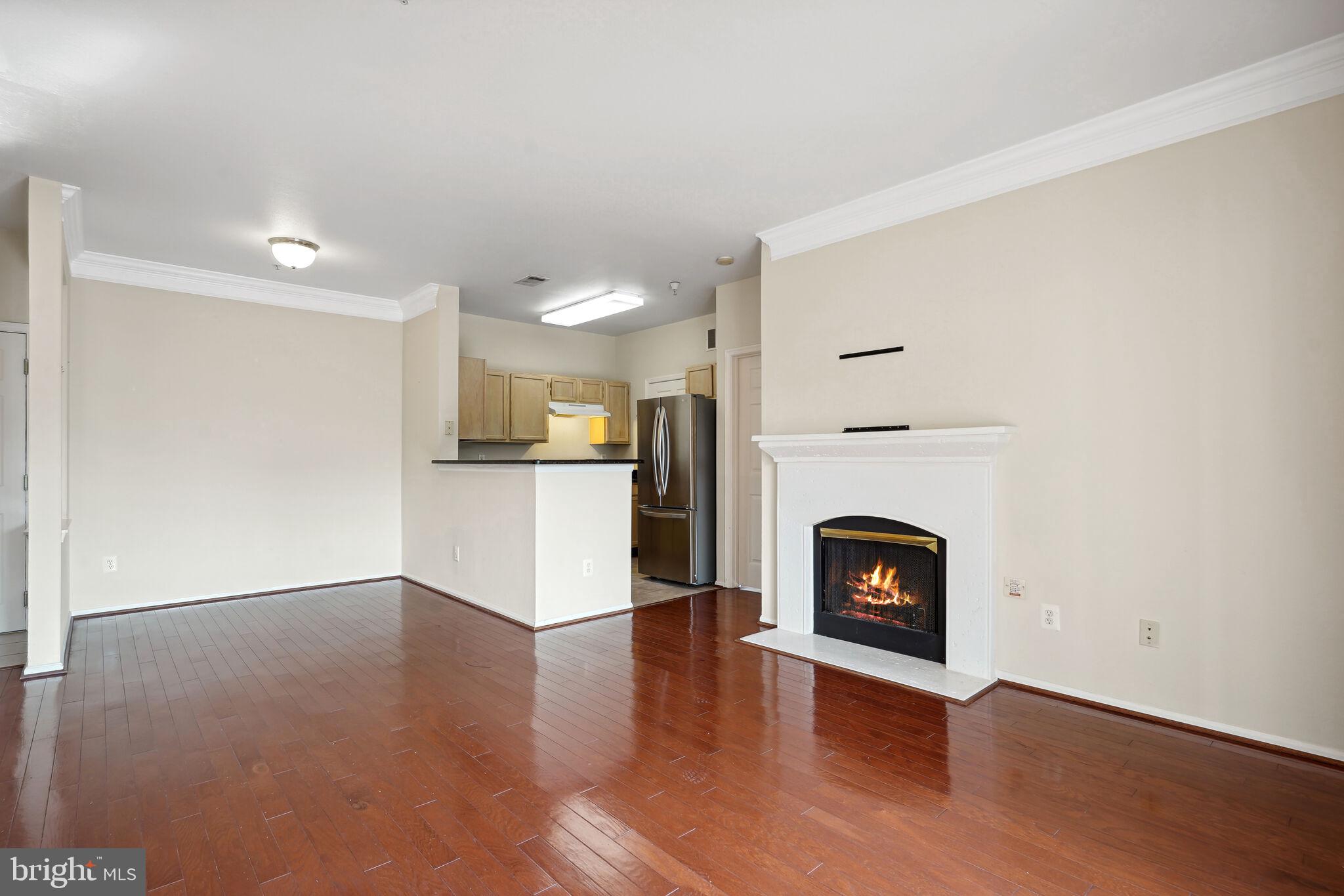 1581 Spring Gate Dr., Unit 5212 McLean, VA 22102 - Photo 4 of 27 Living room w/ dining area