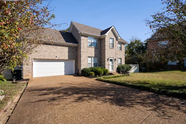 a front view of house with yard