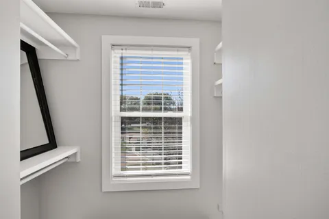 a view of a bathroom with a window