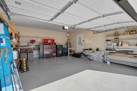 a view of a garage with storage